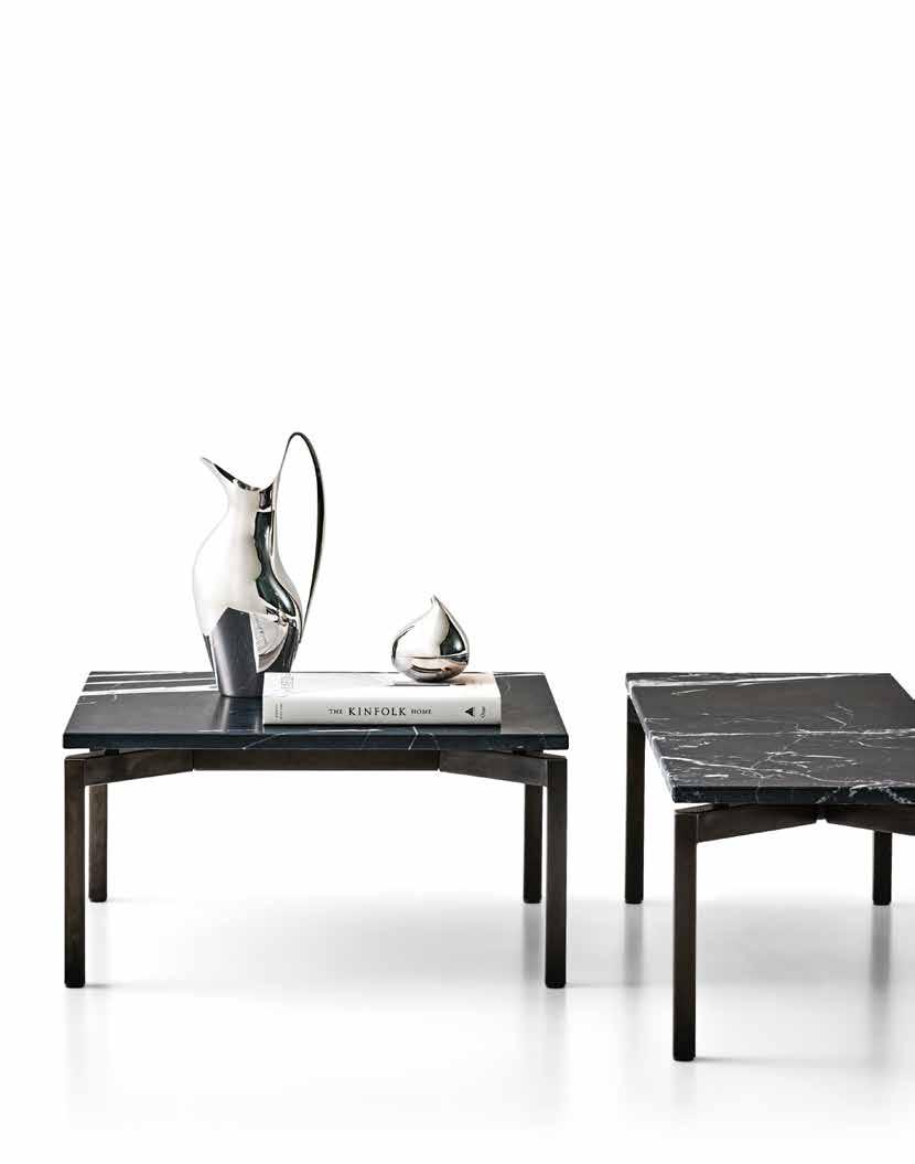 Foersom & Hiort-Lorenzen designed this cool coffee table, which clearly reflects its time with its shiny square chromium legs and matt marble tabletop.