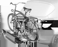Opbevaring 63 Fastgør pedalarmen ved at dreje spændeskruen på pedalarmsbeslaget. Anbring hjulholderne på en måde, så cyklen er nogenlunde vandret.