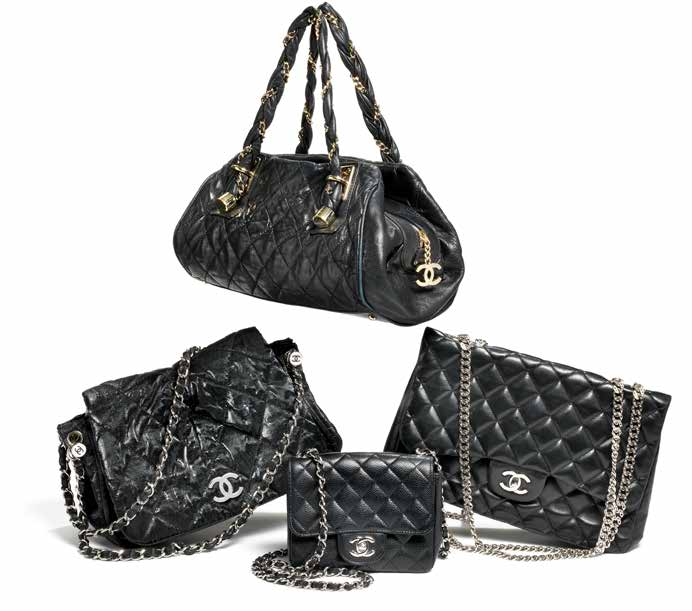 729 730 732 731 729 CHANEL A partly quilted bag of black calfskin with three internal pockets, two handles and golden hardware. L. app. 32 x 20 x 12 cm. Ca. 2010.