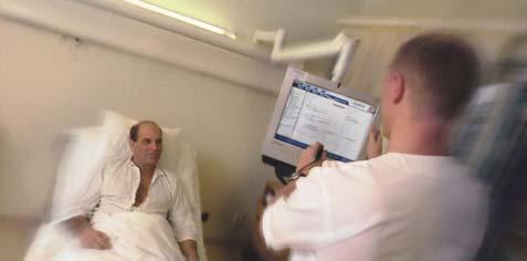 Delt adgang En flad PC Trykfølsom skærm Væg- eller loftshængt Webkamera Kortlæser, som skifter fra patient- til klinikerbrug For patienten IP-telefon evt. m.
