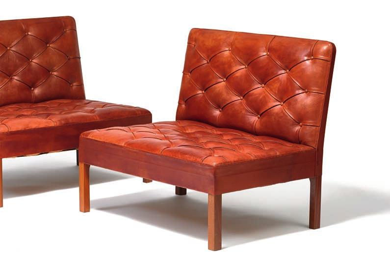 1439 KAARE KLINT b. Frederiksberg 1888, d. Copenhagen 1954 A pair of freestanding mahognay addition sofa units. Sides, seat and back upholstered with original, patinated red leather.