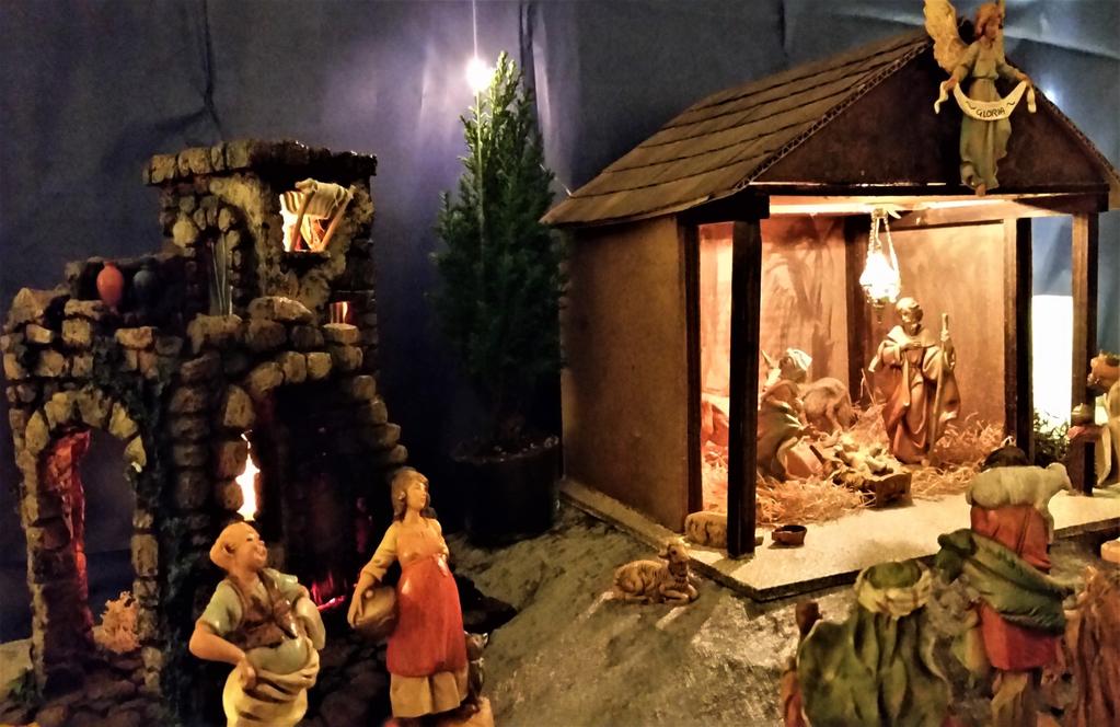 Kromandens jul Kromanden og hans hustru ses yderst til venstre på billedet. Hvert år sætter jeg en julekrybbe op. Det har jeg gjort i mange år.