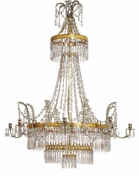 362 362 A german Louis XVI gilt bronze and prism chandelier, with eight scrolled silvered candle arms.
