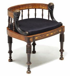 464 constantin Hansen, 1804-1880; "Englestolen" (The angle chair), rosewood and fruit wood ornament inlaid chair, armrests carved with cherub, round profiled legs. ca. 1845.