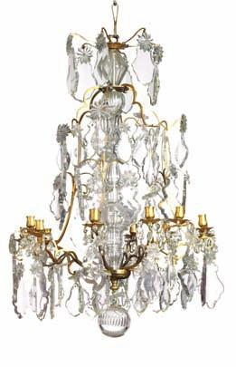 621 A Louis XV style bronze and cut-glass mounted twelwe-light chandelier. 19th century. H. 90cm. diam.