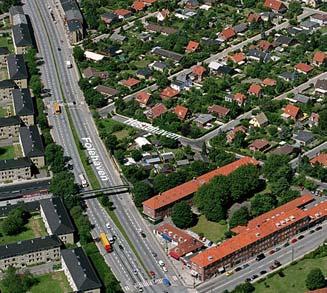 Baggrund for lokalplanen og kommuneplantillægget Loftfoto af lokalplanområdet optaget i juli 2003 (JW luftfoto). Hf.