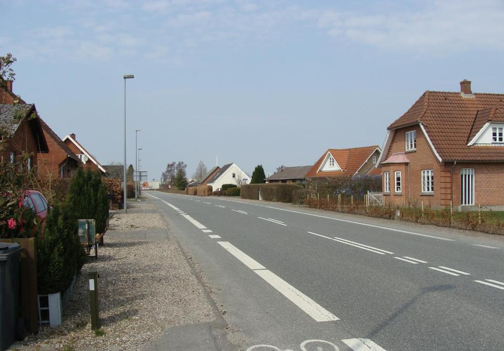 Fig. 9. Kig mod Danrice fra Odensevej 1. Kig mod Danrice fra Odensevej 1. Højlageret vil kunne ses ved kørsel ad Odensevej.