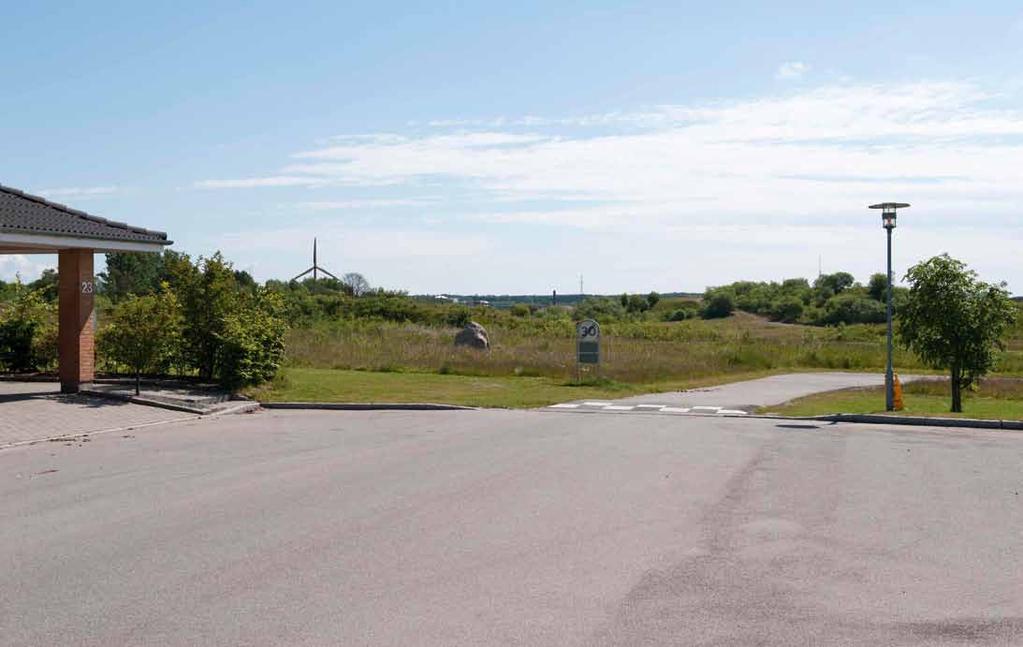 4Nærzone. Visualisering fra villavejen Gl. Nøglegårdsvej i Lynge. Afstand til den nye vindmølle er godt 1,7 km. Herfra oplever man tydeligt vindmøllen over trækronerne.