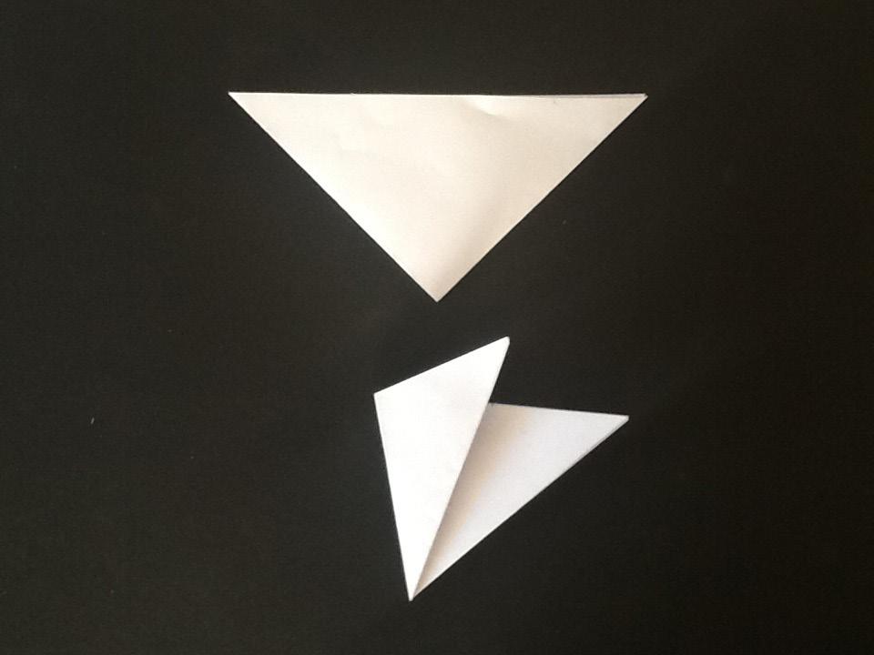 4. Fold nu først fra den ene side og ind til 1/3-dels punktet og fold derefter fra den anden side 5.