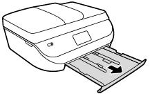 b. Vend forsigtigt printeren på siden for at kunne se printerens underside. c. Kontroller hullet i printeren, hvor papirbakken var.