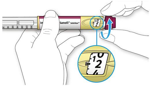 A Vælg 2 enheder ved at dreje dosisvælgeren, indtil dosismarkøren peger på 2. B Tryk injektionsknappen helt i bund. Når der kommer insulin ud af nålespidsen, fungerer pennen korrekt.