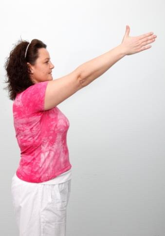 Styrkende øvelser Øvelse 14 Lig på ryggen. Før armen op over hovedet uden hjælp fra den raske arm.