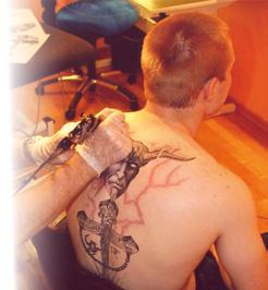 skifter slange for 100, Den Gyldne Drage Birgers Tattoo- &