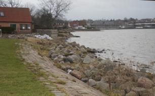 Det aktuelle område: Havneområdet i Roskilde, som tidligere var en havn og dels et åbent eng areal. Siden 1950 har det skiftet status til lystbådehavn, et omfattende museums areal og boliger.