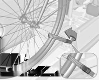Opbevaring 57 Fastgøring af den første cykel 3. Fastgør begge cykelhjul til hjuludsparingerne med holdestropperne. 4. Kontroller, at cyklen er sikret ordentligt. 1.