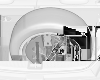 Pleje af bilen 185 4. Fjern remmen 1 fra værktøjskassen og før remmens ende med krog gennem fastsurringskrogen i højre side. 5.