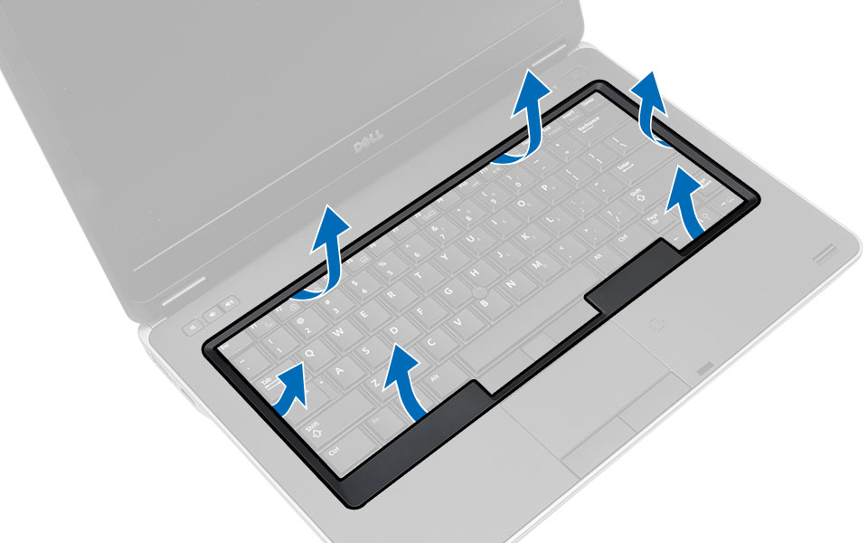 3. Lirk tastaturrammen med en plastiksyl for at frigøre den fra computeren. Løft det op for at fjerne tastaturrammen fra computeren. Sådan installeres tastaturrammen 1.