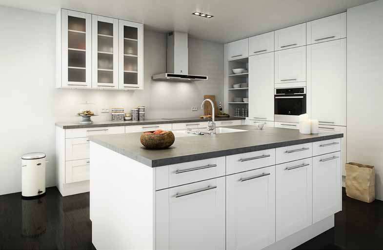 Den hvide farve samt de diskrete udfræsninger gør køkkenet tidløst, aldrig har et design været moderne i så mange år.