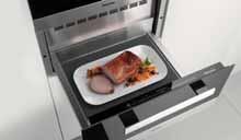 Service- og kopvarmer Servicen forvarmes inden serveringen, uden at du behøver at optage ovnen til det.