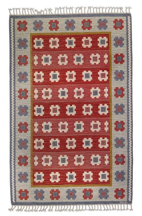 1205 ANNA-GRETA SJÖQVIST Sweden. 20th century. Handwoven wool carpet in "rölakan" flat weave technique with polychrome geometric pattern. Made second half of 20th century. Signed AGS. L. 308 cm. W.