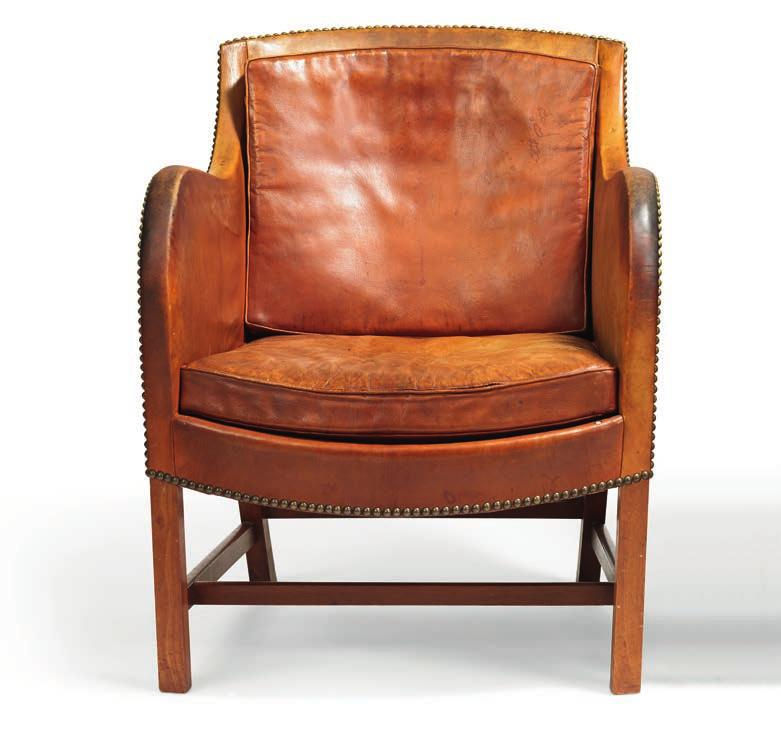 1212 KAARE KLINT b. Frederiksberg 1888, d. Copenhagen 1954 EDVARD KINDT-LARSEN b. Frederiksberg 1901, d. Gentofte 1982 "Mix". A pair of Cuban mahogany easy chairs.