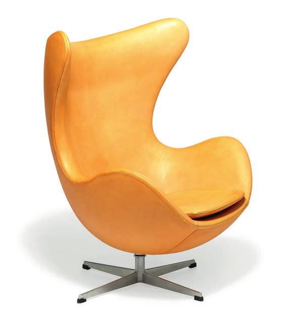 1272 1272 ARNE JACOBSEN b. Copenhagen 1902, d. s.p. 1971 "The Egg Chair". Easy chair with profiled aluminum base. Sides, back and loose seat cushion upholstered with patinated natural leather.
