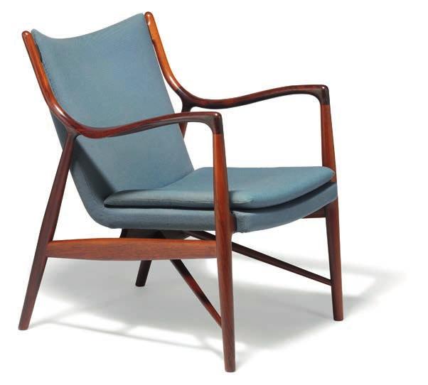 1287 FINN JUHL b. Frederiksberg 1912, d. Ordrup 1989 "FJ 45". A Brazilian rosewood easy chair. Seat, back and loose seat cushion upholstered with original blue wool.