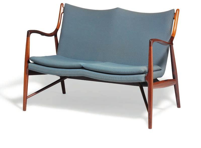 1288 FINN JUHL b. Frederiksberg 1912, d. Ordrup 1989 "FJ 45". A Brazilian rosewood two seater sofa. Seat, back and loose seat cushion upholstered with original blue wool.
