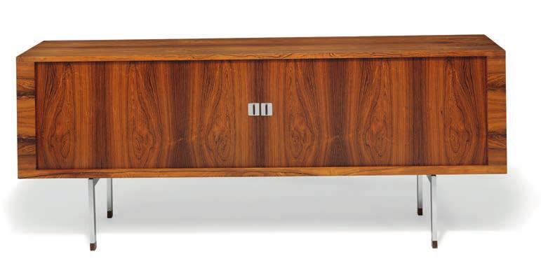 1311 * HANS J. WEGNER b. Tønder 1914, d. Gentofte 2007 "RY 25". A Brazilian rosewood sideboard, steel frame with rosewood shoes. Front with two tambour doors. Oak interior with shelves and trays.