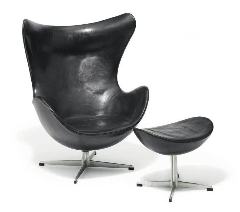 1321 ARNE JACOBSEN b. Copenhagen 1902, d. s.p. 1971 "The Egg Chair". Early easy chair with matching footstool with profiled aluminum base.