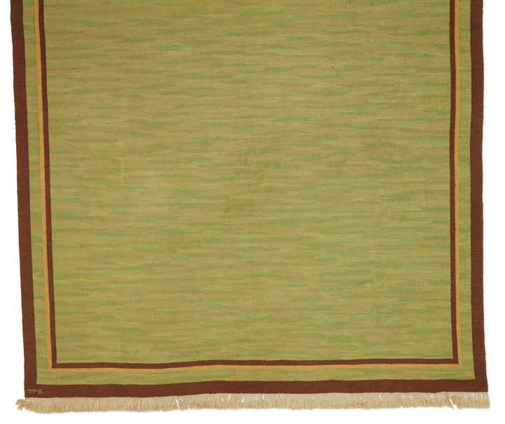 1366 1366 POLLY BJÖRKMAN Large green flatwoven carpet with brown and yellow edges. Signed TPB. This example made approx. 1940s by Textilatelier Polly Björkman, Kristianstad. L. 416 cm. W. 270 cm.