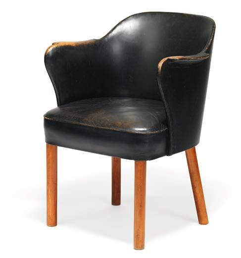 This example made 1940s by Fritz Hansen, with maker's paper label.