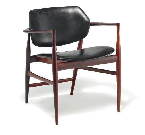 1385 1385 IB KOFOD-LARSEN b. 1921, d. 2003 A rare "Elizabeth" armchair with Brazilian rosewood frame. Seat and back upholstered with black leather. Designed 1958.