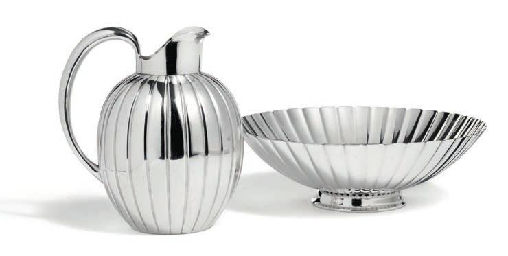 1122 1122 SIGVARD BERNADOTTE b. 1907, d. 2002 A sterling silver strawberry set comprising a strawberry dish and a cream pitcher. Georg Jensen 1945-1977. Design no. 856 A and 856 B.
