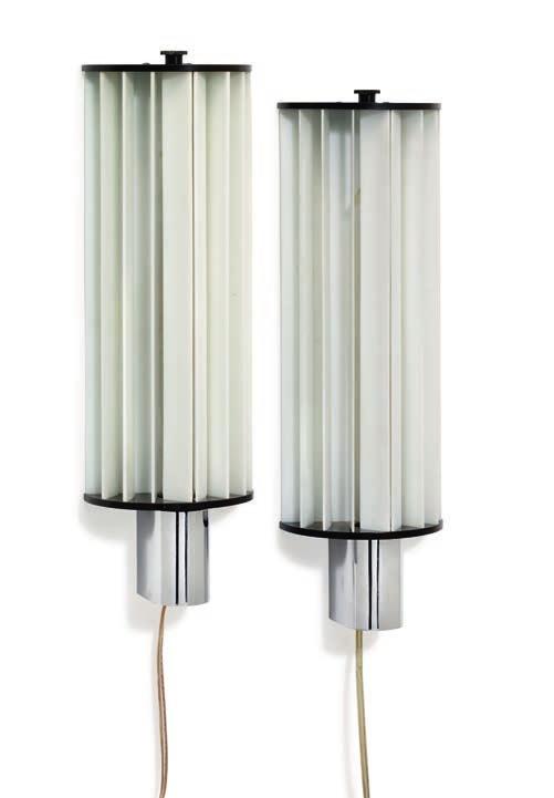 1079 1079 POUL HENNINGSEN b. Ordrup 1894, d. Hillerød 1967 A pair of rare bracket lamps with opal glass slats with black bakelite frame and cromed metal mounting.