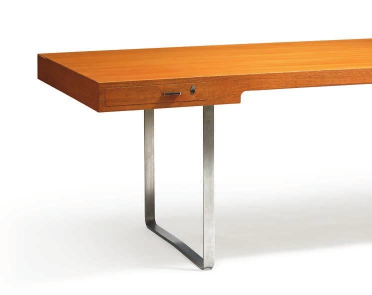 1088 1088 HANS J. WEGNER b. Tønder 1914, d. Gentofte 2007 "JH 810". Freestanding mahogany desk, rail with two integrated drawers. Runner legs and handles of chromed steel. Designed 1970.