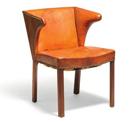 1093 FRITS HENNINGSEN b. 1889, d. 1965 Armchair with mahogany frame. Seat, back and armrests upholstered with patinated cognac colored leather, fitted with brass nails. Designed 1933.