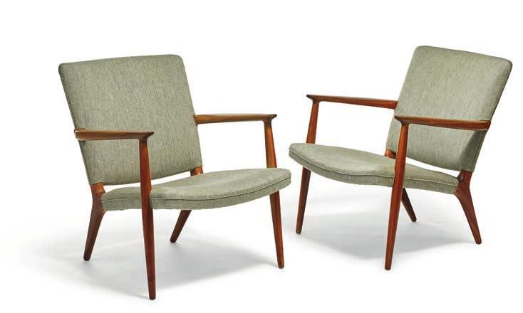 1116 1116 JACOB KJÆR b. 1896, d. 1957 A pair of low teak armchairs. Seat and back upholstered with grey wool. These examples made 1957 by cabinetmaker Jacob Kjær, with maker's paper label.