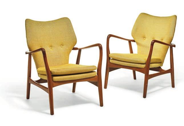 1120 1120 IB MADSEN Denmark 20th Century ACTON SCHUBELL Denmark 20th Century A pair of teak easy chairs.