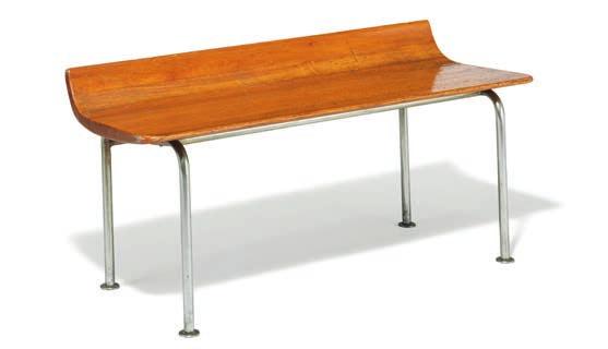 Gentofte 1984 A bench with chromed steel tube frame. Seat of solid, lacquered teak with raised back. Designed and made 1936-1937. H. 50 cm. D. 42 cm. L. 111 cm.