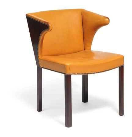 1162 FRITS HENNINGSEN b. 1889, d. 1965 Armchair with dark polished mahogany frame. Seat, back and armrests upholstered with light brown colored leather, fitted with brass nails. Designed 1933.