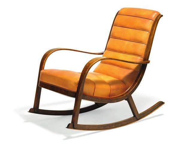]: "40 Years of Danish Furniture Design", vol. 1, pp. 156-157. DKK 30,000-40,000 / 4,050-5,400 1162 1163 FRITZ HANSEN Rocking chair with stained beech frame.