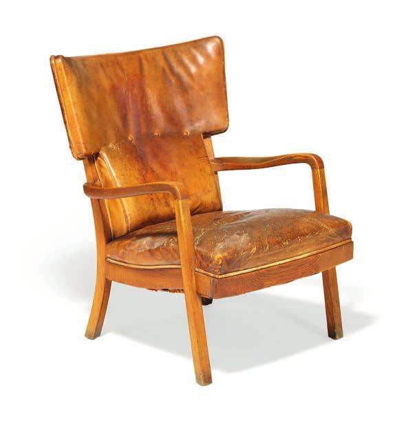 1167 CD PETER HVIDT b. Copenhagen 1916, d. s.p. 1986 Unique wingback easy chair with elm wood frame. Seat and back upholstered with original, patinated leather, back fitted with buttons.