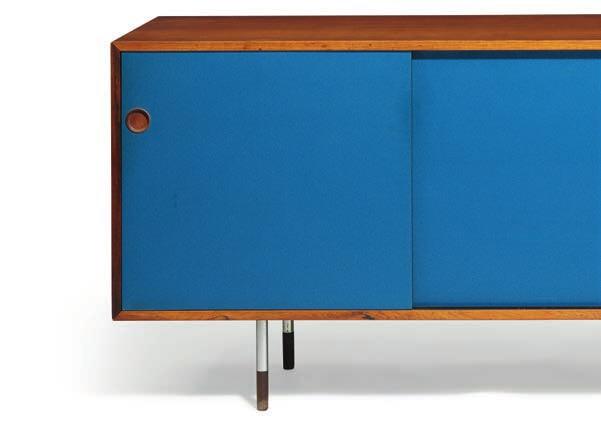 982 ARNE VODDER b. 1926, d. 2009 "Credenza". Freestanding Brazilian rosewood sideboard on six round steel legs with rosewood shoes. Front with two reversible sliding doors with resp.