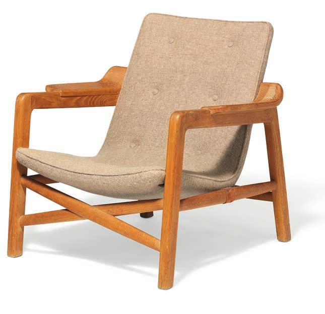 985 EDVARD KINDT-LARSEN b. Frederiksberg 1901, d. Gentofte 1982 TOVE KINDT-LARSEN b. 1906, d. 1994 A pair of early easy chairs with patinated oak frame.