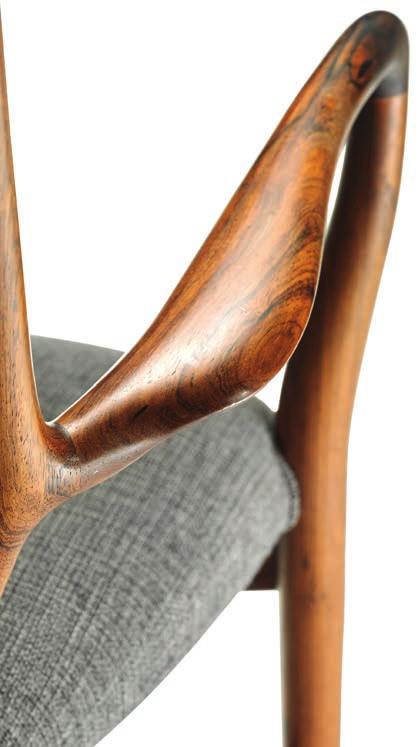 1003 FINN JUHL b. Frederiksberg 1912, d. Ordrup 1989 "FJ 46". A Brazilian rosewood armchair. Seat and back upholstered with original grey wool. Designed 1946. This example made approx.