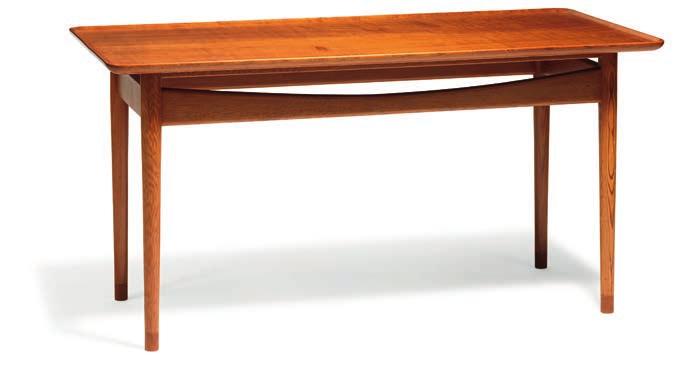 1008 CD FINN JUHL b. Frederiksberg 1912, d. Ordrup 1989 Unique coffee table with rectangular top of solid teak and raised edges.