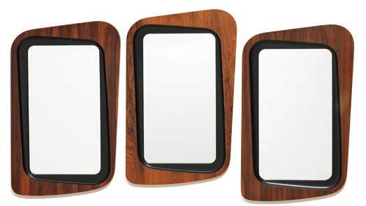 1012 SWEDISH DESIGN A set of three sculpted trapeze-shaped wall mirrors with rosewood frame. These examples manufactured circa 1950s. H. 82 cm. W. 52 cm.