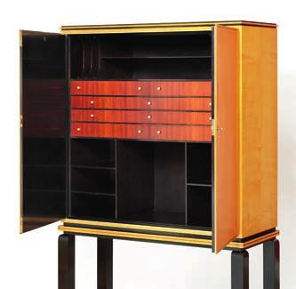 1050 AXEL EINAR HJORTH b. Krokek 1888, d. Stockholm 1959 "Korall". Cabinet of black lacquered wood, sycamore and lacuered birch.