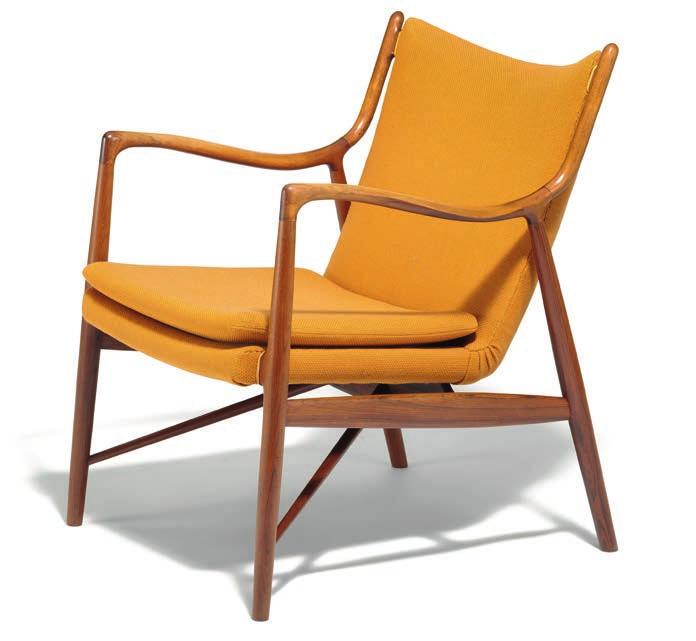 1063 FINN JUHL b. Frederiksberg 1912, d. Ordrup 1989 "FJ 45". A Brazilian rosewood easy chair. Seat, back and loose seat cushion upholstered with ochre yellow wool.